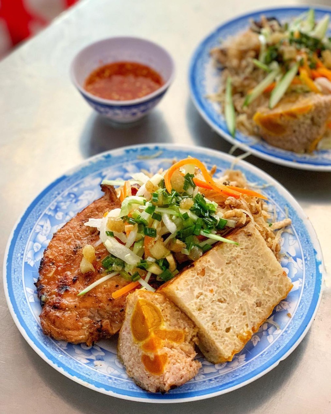 Hinh anh Cơm tấm: Từ hạt gạo vỡ của giới cần lao đến món ăn biểu trưng cho ẩm thực Sài Gòn 9